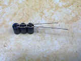 Three capacitors soldered together